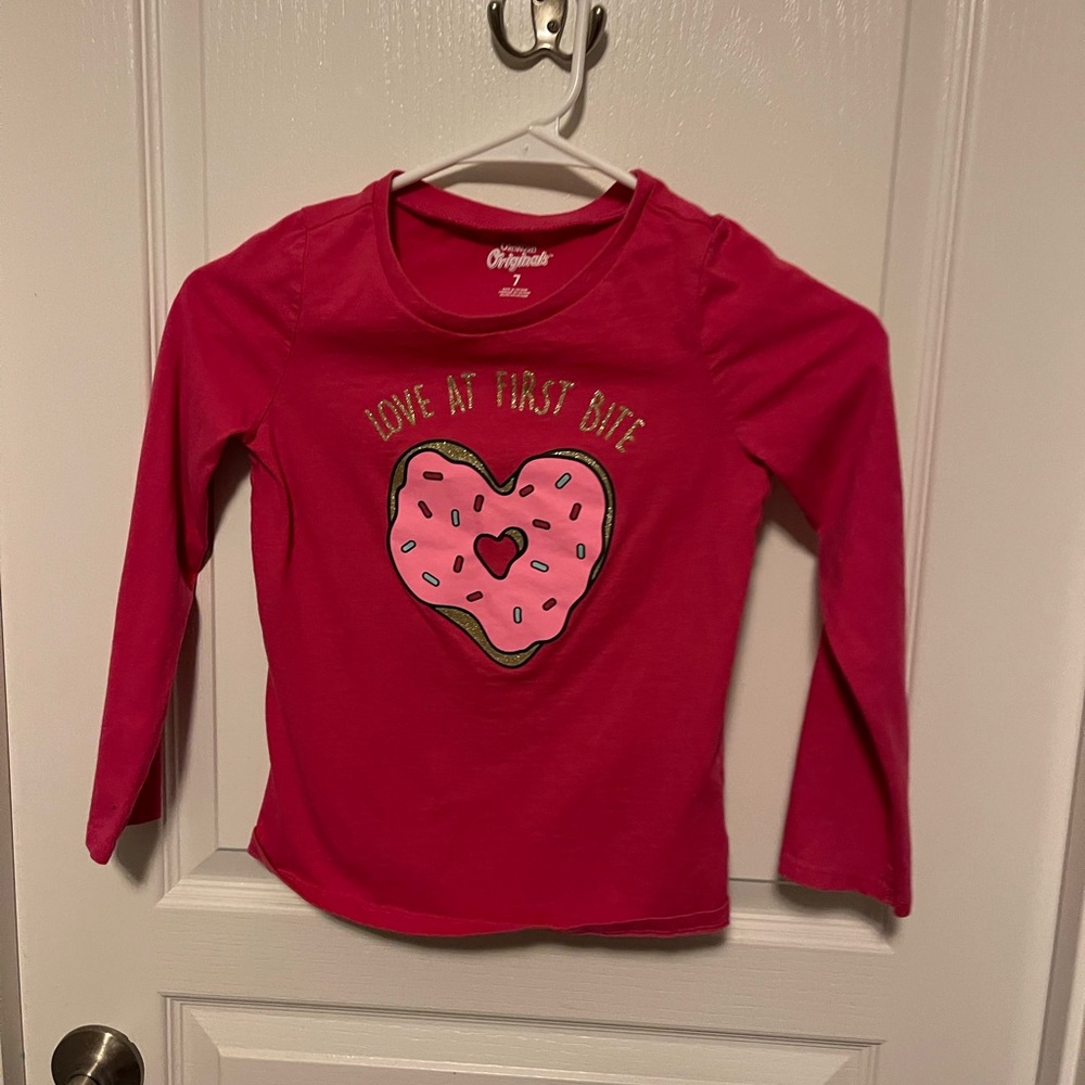 Set of 6 Girls long sleeve T's. Good Condition.